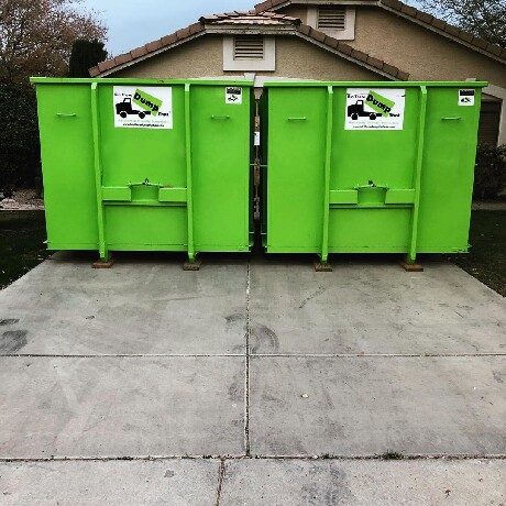 Two Dumpsters On Driveway - Bin There Dump That